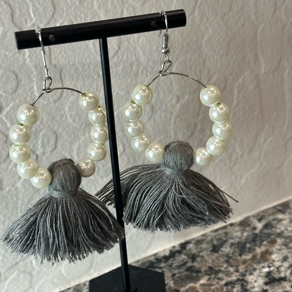 pearl hoop and grey tassel earrings